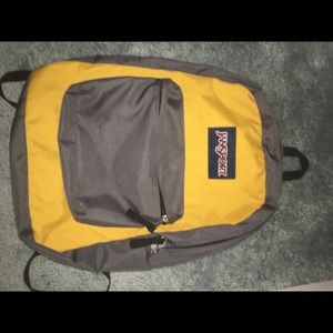 Jansport yellow and gray backpack